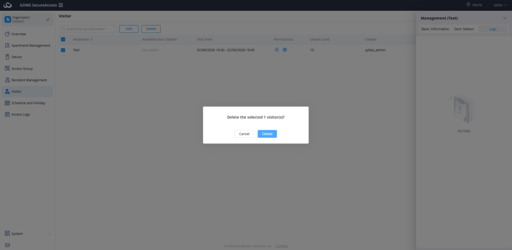 Delete Visitor - Documentation Center Delete confirmation dialog for the selected visitor, with Cancel and Delete buttons; page dimmed in the background